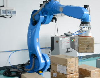 Aplicação de robôs guiados da Visão 3D no posicionamento do produto e apreensão